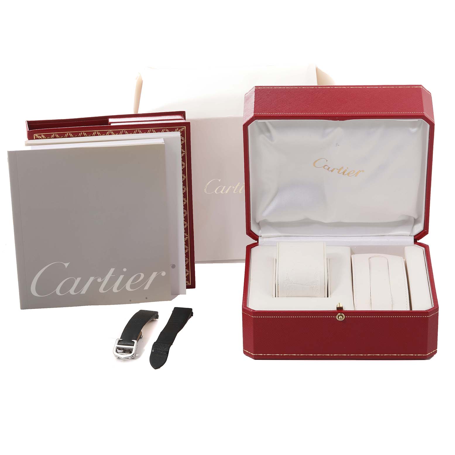 The image shows a Cartier Roadster W62016V3 Women's Stainless Steel Silver Dial W62016V3 Women's Stainless Steel Silver Dial watch box, including instructions, a strap, and the red watch case with white interior compartments.
