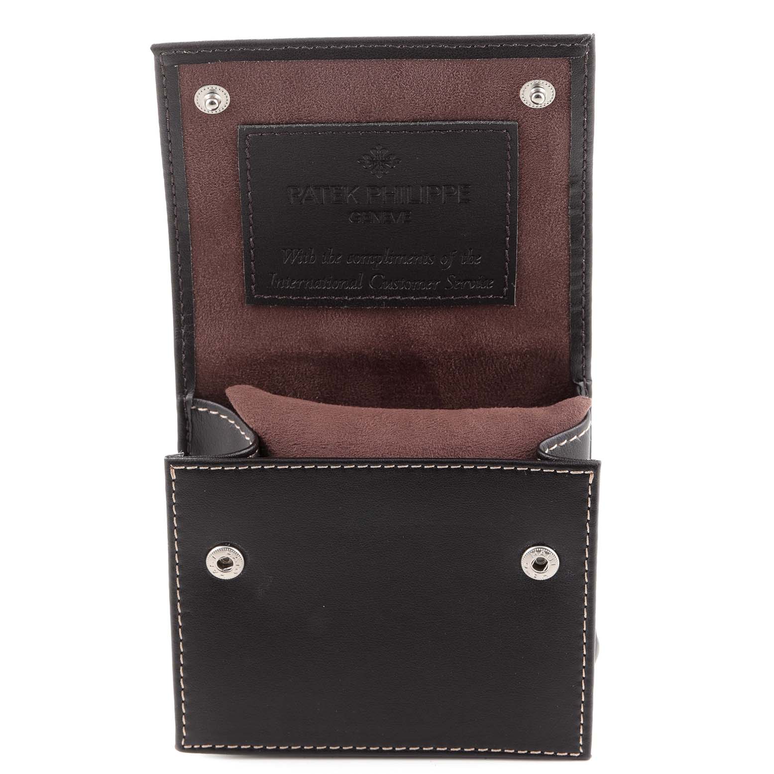 This image shows the open case for a Patek Philippe Calatrava 6000G Men's White Gold Grey Dial 6000G Men's White Gold Grey Dial watch, viewed from the front.