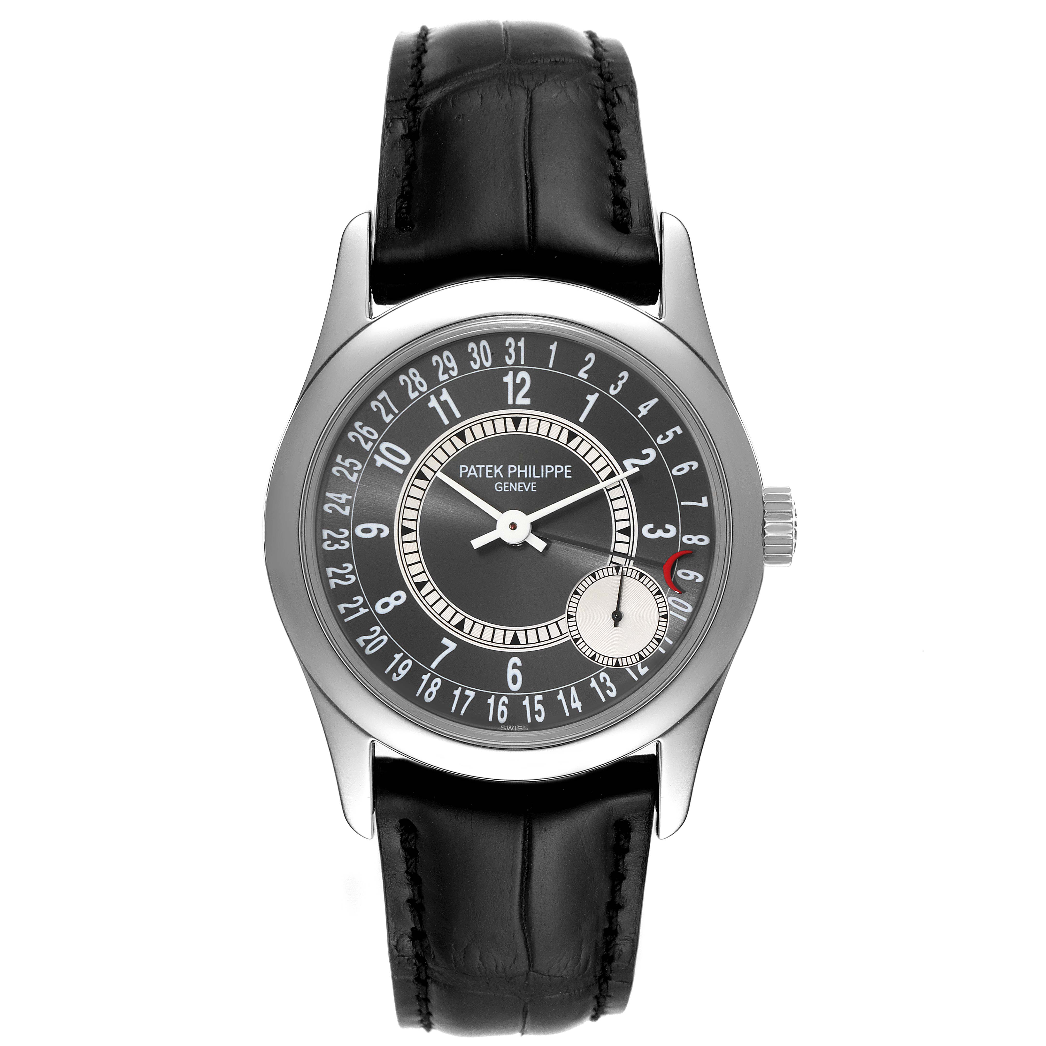 This image displays a front view of a Calatrava watch by Patek Philippe, showing its dial, hands, casing, and leather strap.