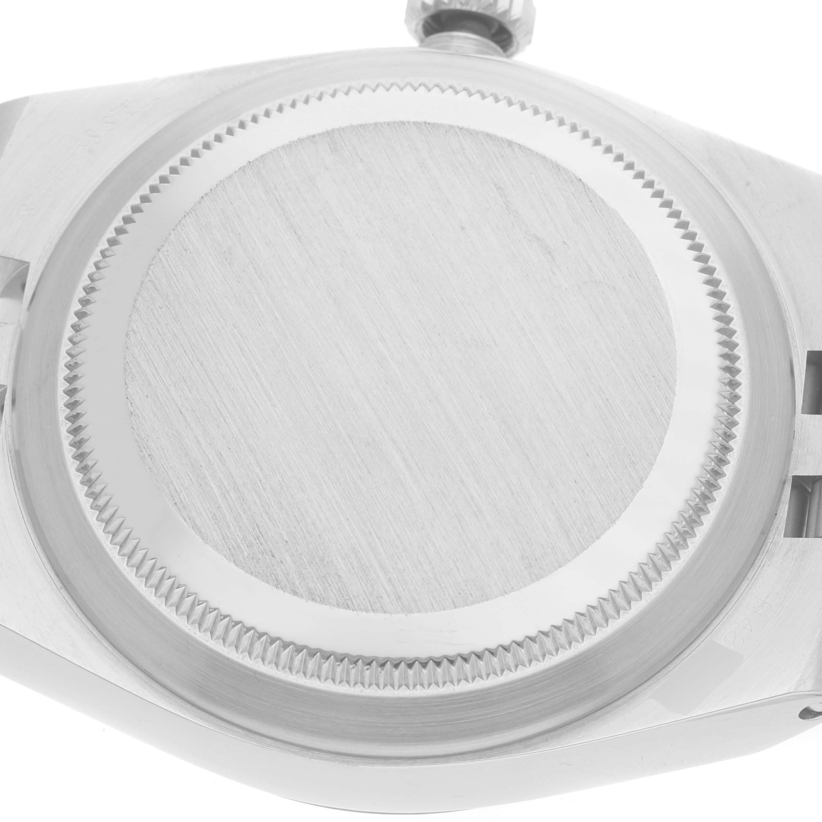 This image shows the back casing of a Rolex Oysterquartz 17014 Men's Stainless Steel Silver Dial 17014 Men's Stainless Steel Silver Dial watch, featuring the toothed edge and brushed finish.