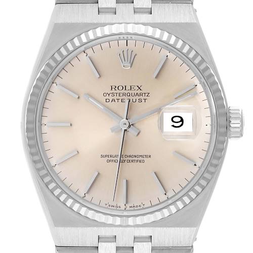 The image shows a front view of the Rolex Oysterquartz 17014 Men's Stainless Steel Silver Dial 17014 Men's Stainless Steel Silver Dial Datejust watch, highlighting the dial, bezel, crown, and a portion of the bracelet.