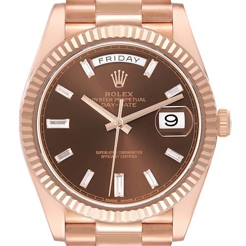The Rolex President 228235 Men's Rose Gold Brown Dial 228235 Men's Rose Gold Brown Dial model is shown from the front, displaying the dial, day/date windows, and part of the bracelet.