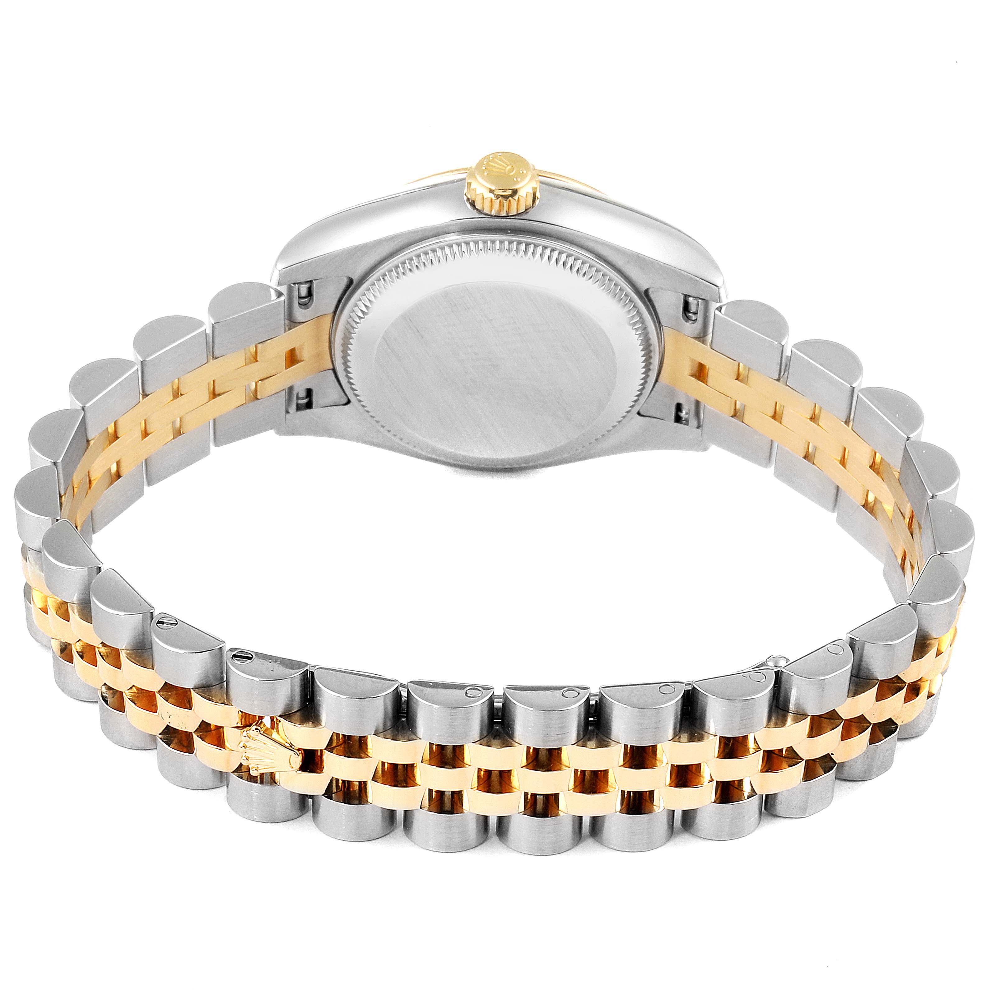 The image shows the back view of a Rolex Datejust 179173 Women's Steel and Gold (two tone) Champagne Dial 179173 Women's Steel and Gold (two tone) Champagne Dial watch, highlighting its case back and two-tone jubilee bracelet.