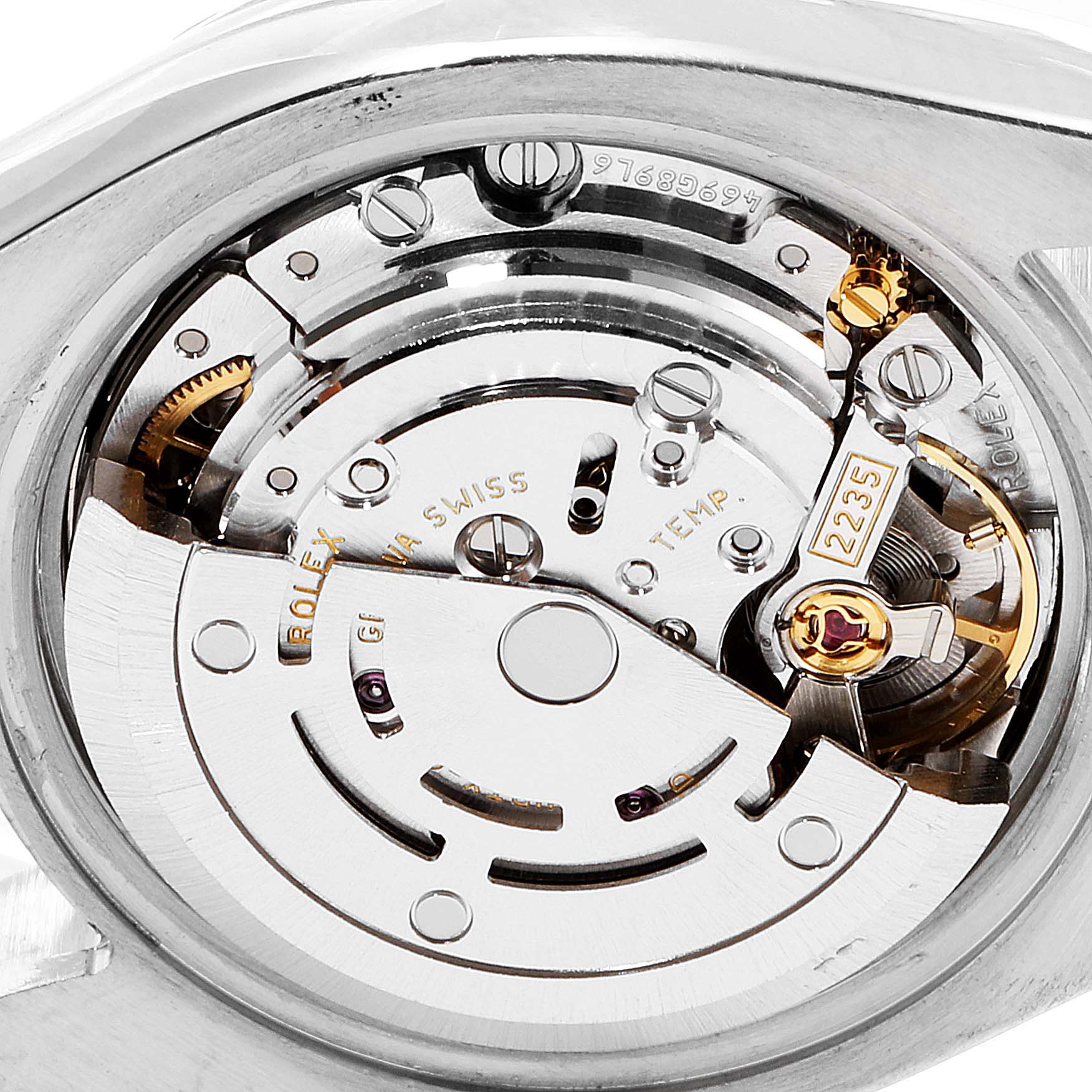 The image shows the internal movement mechanism of a Rolex Datejust 179173 Women's Steel and Gold (two tone) Champagne Dial 179173 Women's Steel and Gold (two tone) Champagne Dial watch from a close-up angle.