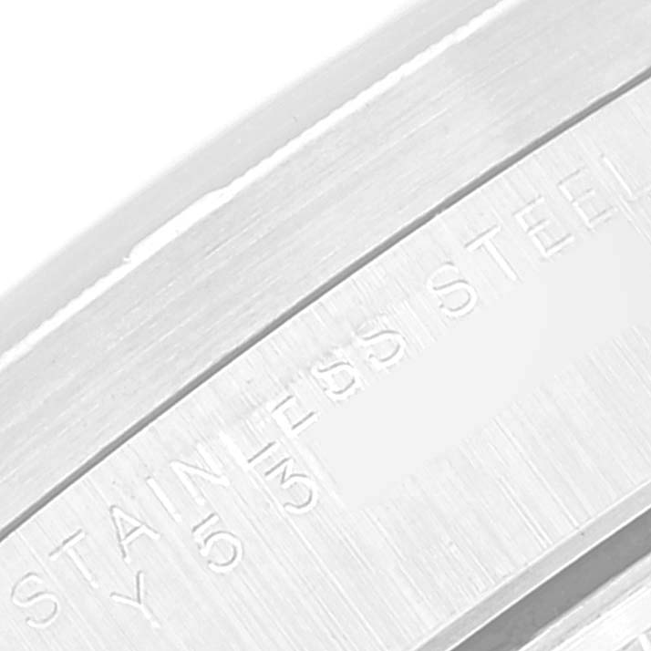 The image shows a close-up of the stainless steel case of the Rolex Date 15210 Men's Stainless Steel Black Dial 15210 Men's Stainless Steel Black Dial model watch.