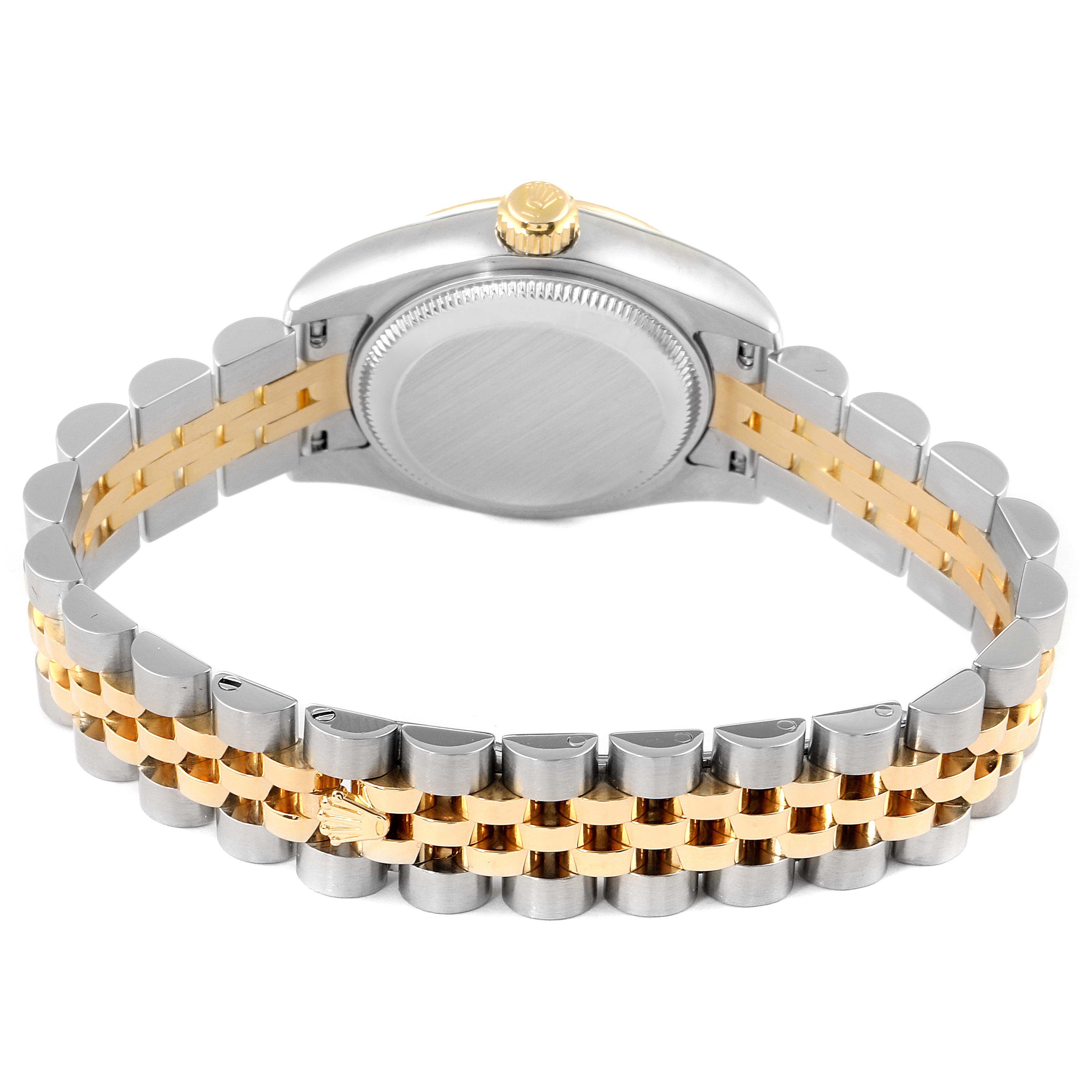 This image shows the back case and bracelet of a Rolex Datejust 179173 Women's Steel and Gold (two tone) Silver Dial 179173 Women's Steel and Gold (two tone) Silver Dial watch, highlighting its two-tone metal design.