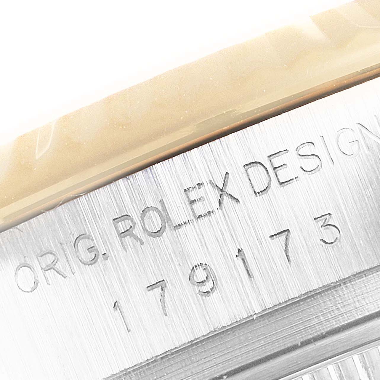 Close-up view of the model and design numbers engraved on the side of a Rolex Datejust 179173 Women's Steel and Gold (two tone) Silver Dial 179173 Women's Steel and Gold (two tone) Silver Dial watch.