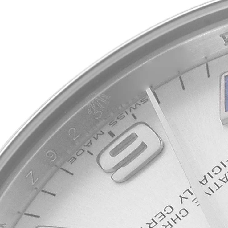 The image shows a close-up of the dial edge, featuring hour markers and text on a Rolex Mid-Size 177200 Women's Stainless Steel Silver Dial 177200 Women's Stainless Steel Silver Dial watch.
