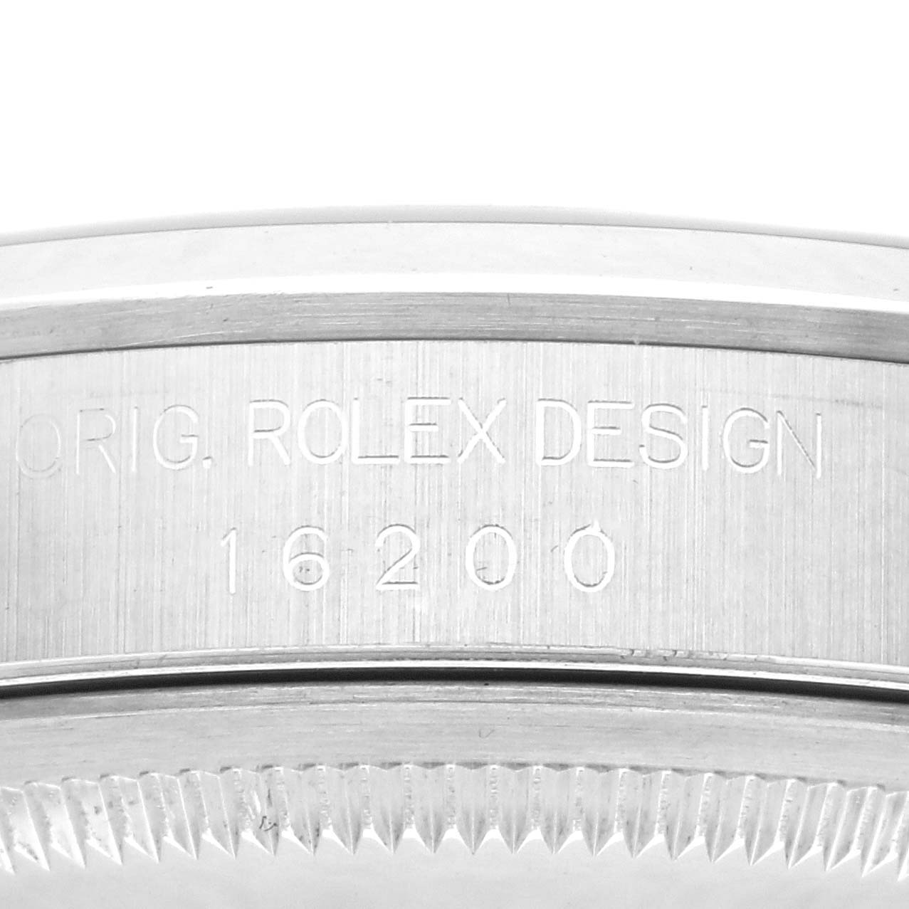 The image shows the side engraving and bezel of a Rolex Datejust 16200 Men's Stainless Steel Blue Dial 16200 Men's Stainless Steel Blue Dial model.