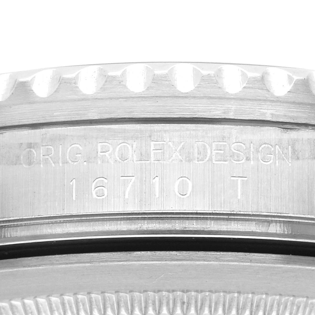 The image shows a close-up of the side engraving on a Rolex GMT-Master 16710 Men's Stainless Steel Black Dial 16710 Men's Stainless Steel Black Dial, displaying "ORIG. ROLEX DESIGN 16710 T".