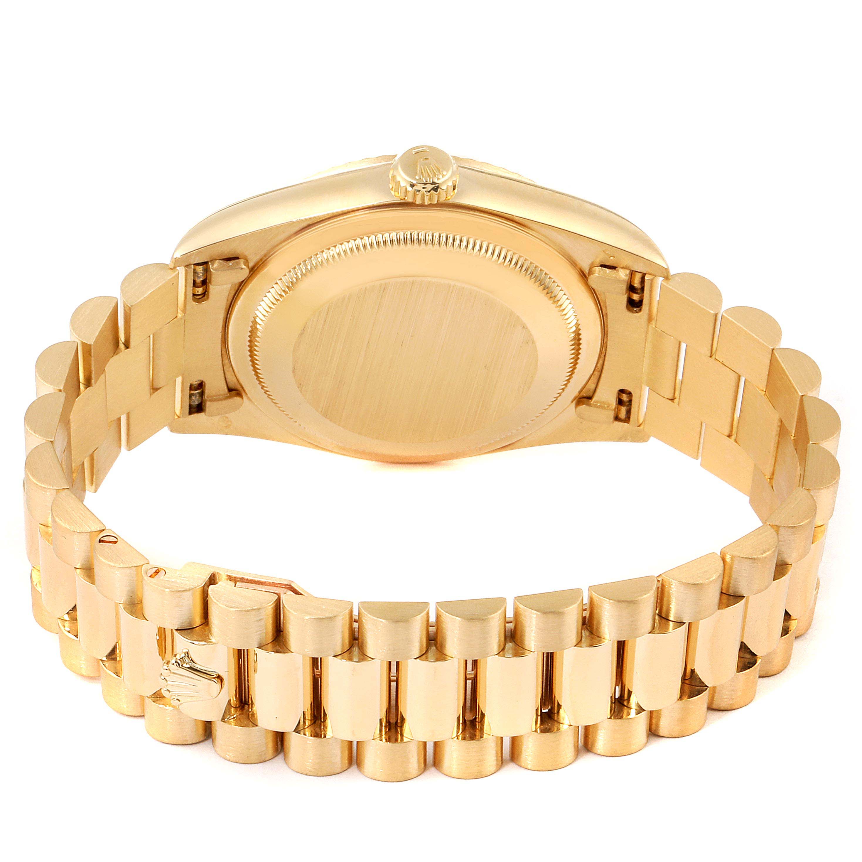 The image shows the rear side of the Rolex President 18238 Men's Yellow Gold Champagne Dial 18238 Men's Yellow Gold Champagne Dial watch, focusing on its gold case back and bracelet.