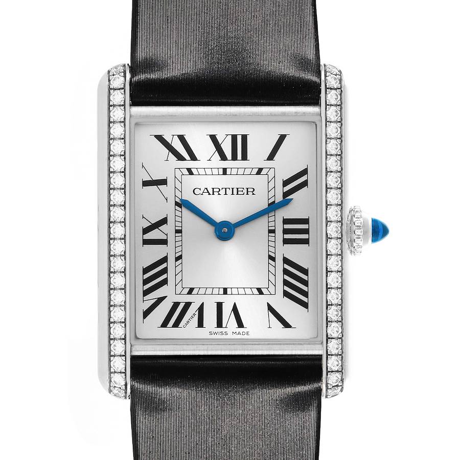 The Cartier Tank Must W4TA0017 Women's Stainless Steel Silver Dial W4TA0017 Women's Stainless Steel Silver Dial watch is shown from a front angle, highlighting the face, Roman numerals, and diamond-encrusted bezel.