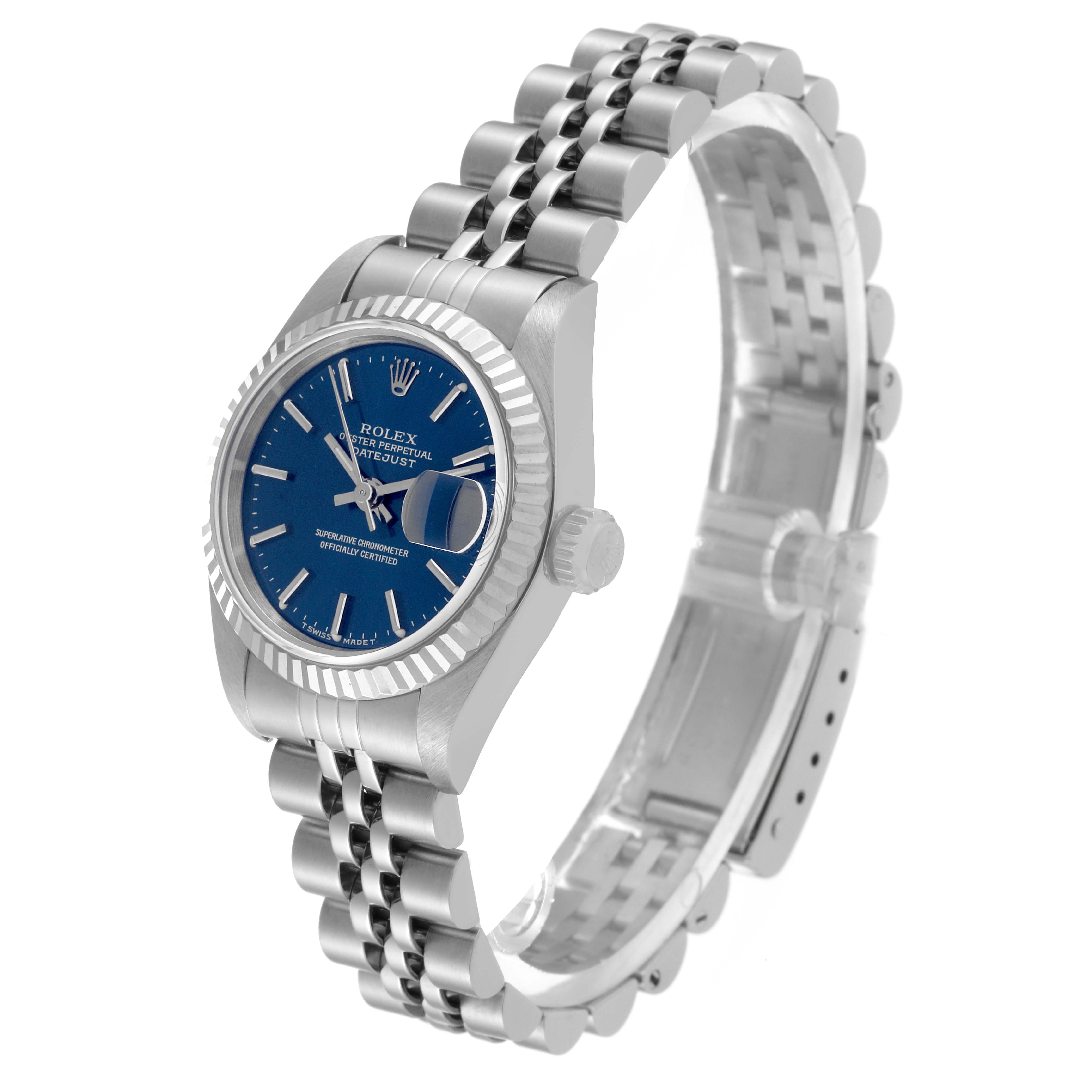The image shows a side angle of the Rolex Datejust 69174 Women's Stainless Steel Blue Dial 69174 Women's Stainless Steel Blue Dial watch, highlighting its blue dial, fluted bezel, and jubilee bracelet.