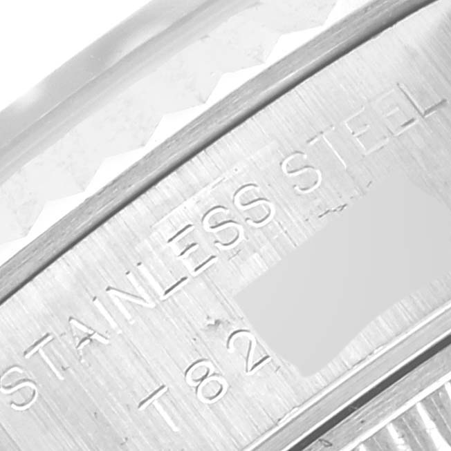 This image shows a close-up of the stainless steel engraving on the Rolex Datejust 69174 Women's Stainless Steel Blue Dial 69174 Women's Stainless Steel Blue Dial watch case.