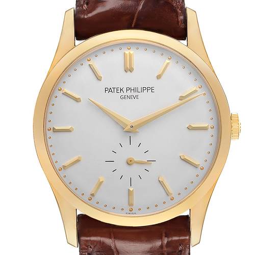 The Patek Philippe Calatrava 5196J watch is shown from the front, highlighting its yellow gold case, silver dial, and leather strap.