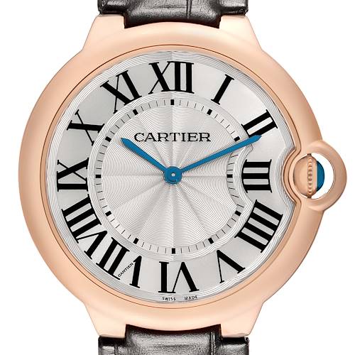 The image shows a frontal view of the Cartier Ballon Bleu W6920083 Men's Rose Gold Silver Dial watch, highlighting its circular face, Roman numerals, and blue hands.