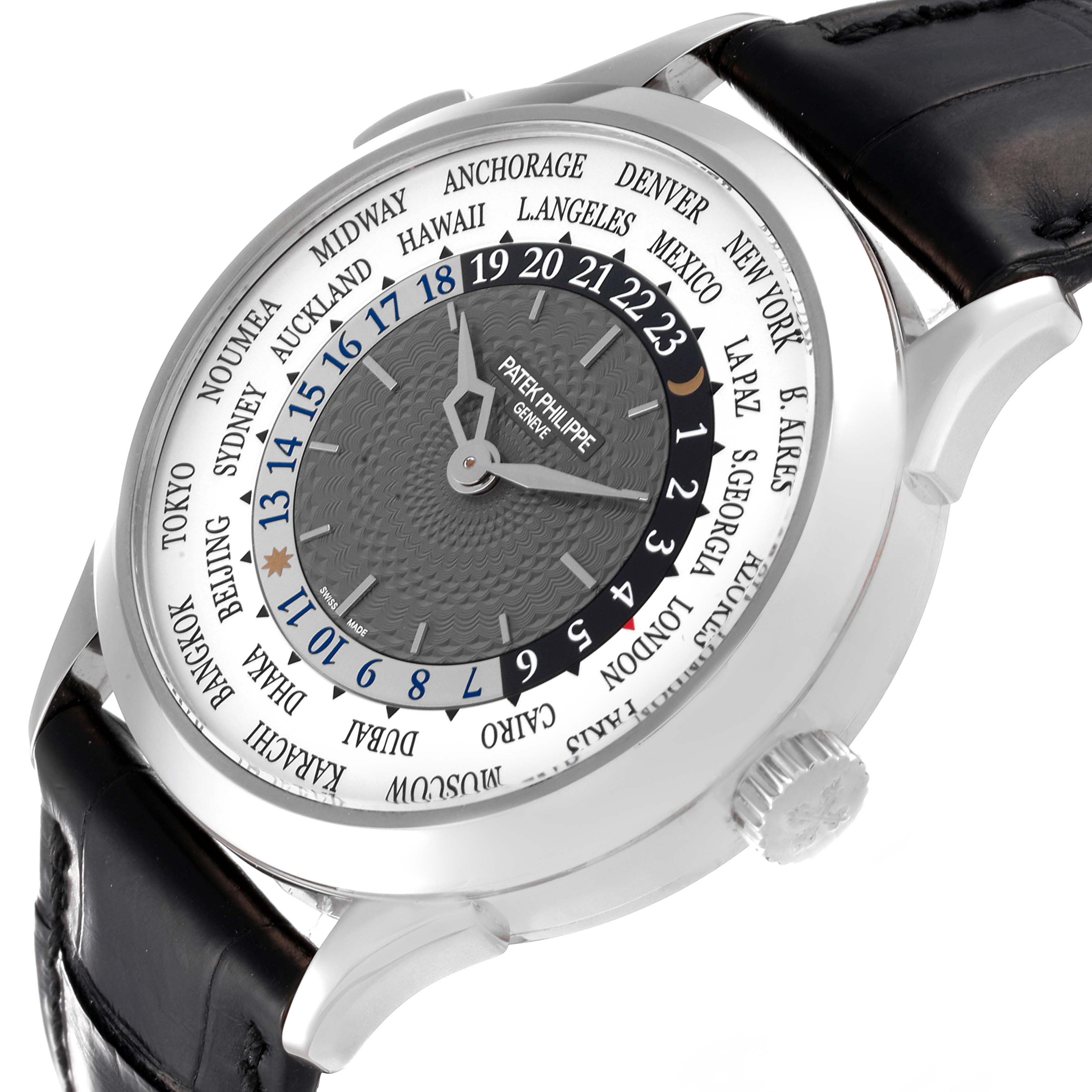 The image shows a Patek Philippe Complications 5230G-001 Men's White Gold Grey Dial 5230G-001 Men's White Gold Grey Dial watch from an angled side view, featuring its dial, bezel, and leather strap.