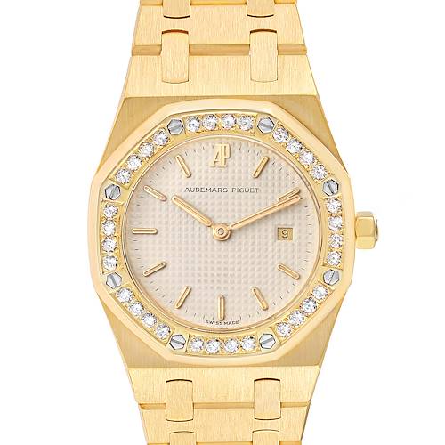 The image shows a front view of the Audemars Piguet Royal Oak 56271BA Women's Yellow Gold Beige Dial 56271BA Women's Yellow Gold Beige Dial watch featuring a gold case, diamond bezel, and gold bracelet.