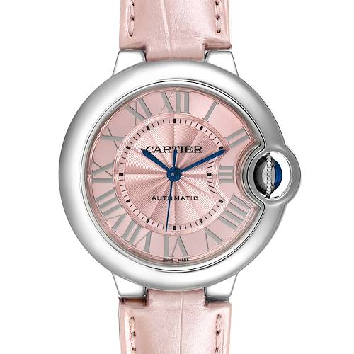 The image shows a front view of the Ballon Bleu de Cartier watch with a pink dial and strap.