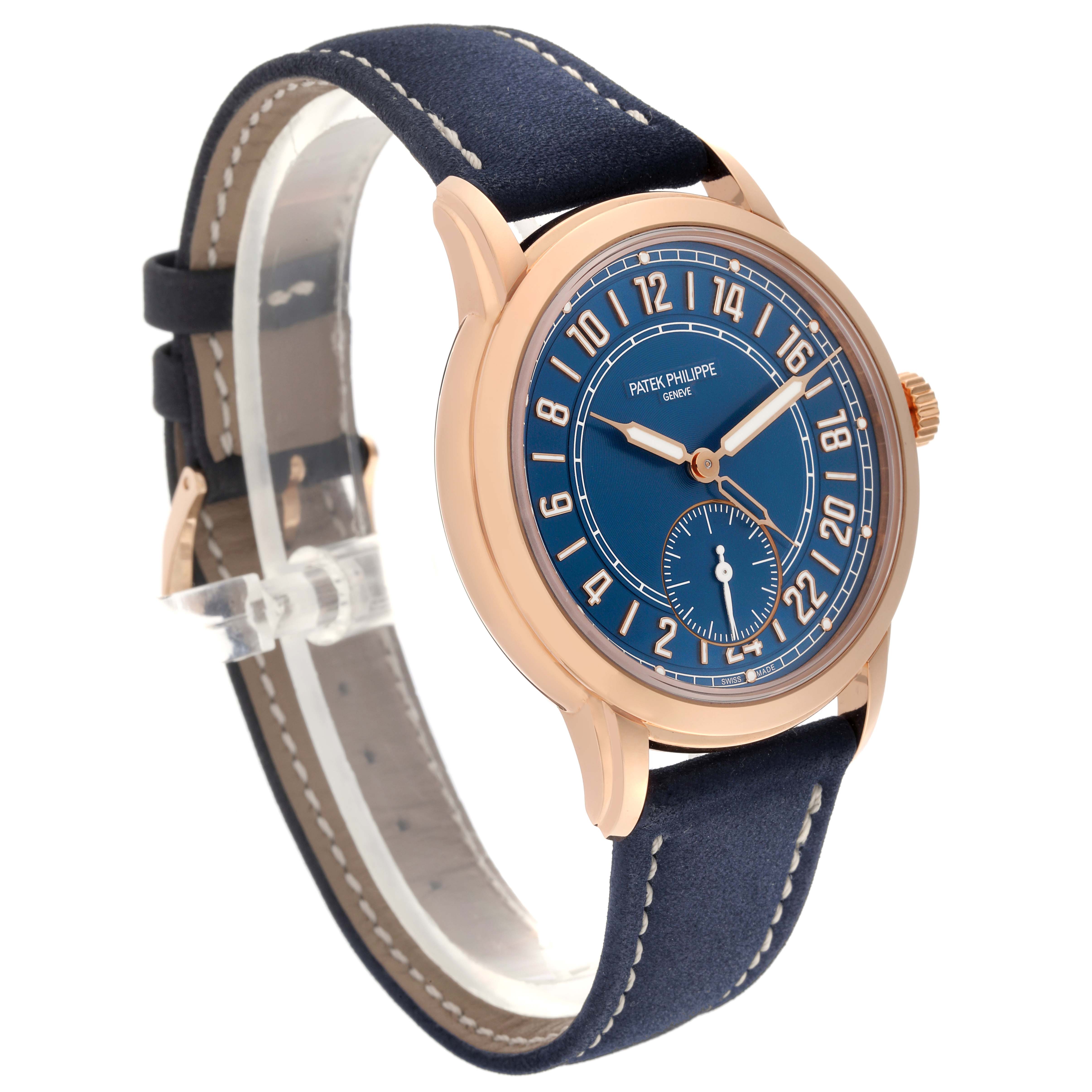 The Patek Philippe Calatrava 5224R-001 Men's Rose Gold Blue Dial 5224R-001 Men's Rose Gold Blue Dial watch is shown at a three-quarter angle, highlighting the dial, hands, and leather strap.