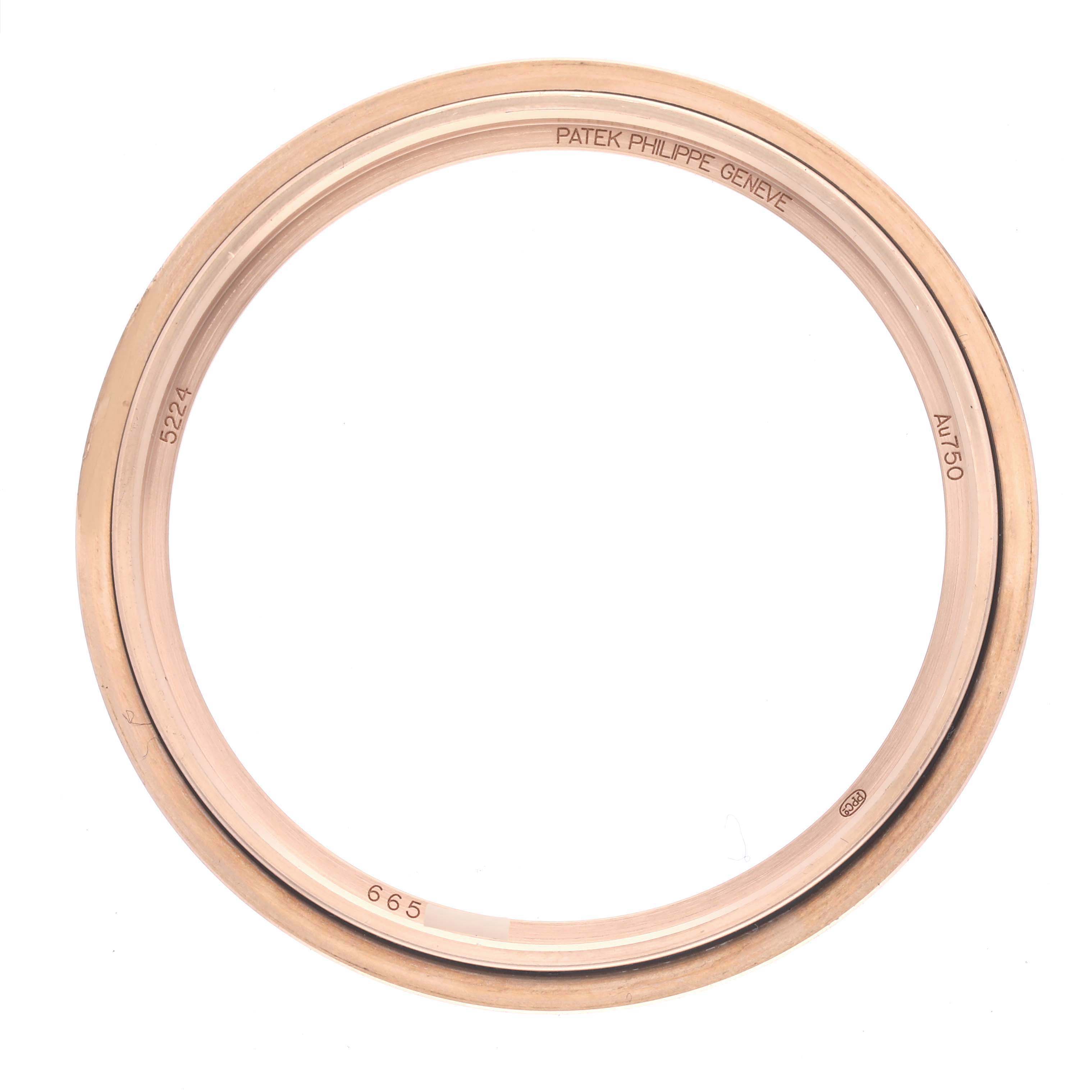 The image shows a top view of a Patek Philippe Calatrava 5224R-001 Men's Rose Gold Blue Dial 5224R-001 Men's Rose Gold Blue Dial bezel without the watch face.