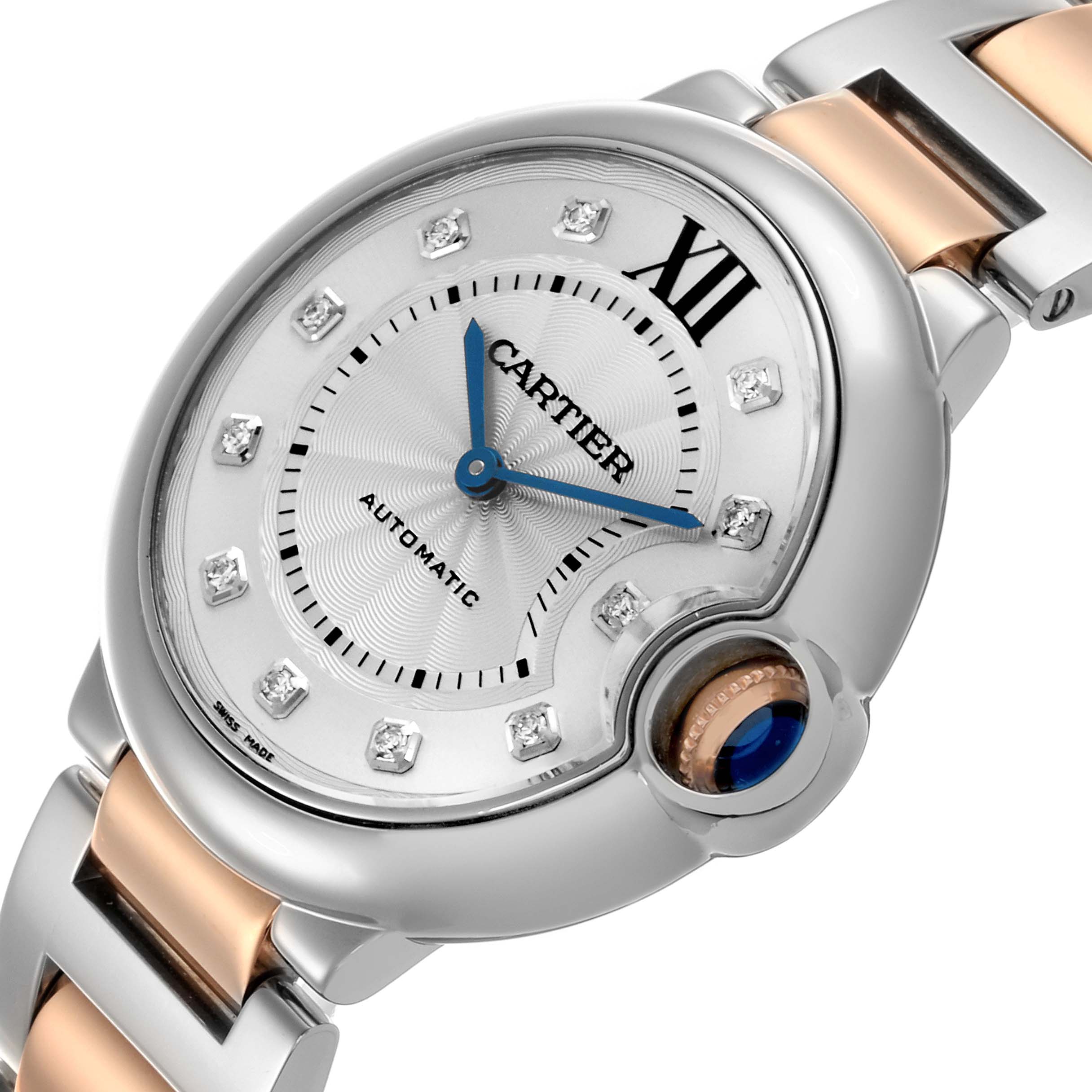 The Cartier Ballon Bleu W3BB0018 Women's Steel and Gold (two tone) Silver Dial W3BB0018 Women's Steel and Gold (two tone) Silver Dial watch is shown at an angle highlighting the dial, crown with blue cabochon, and two-tone bracelet.