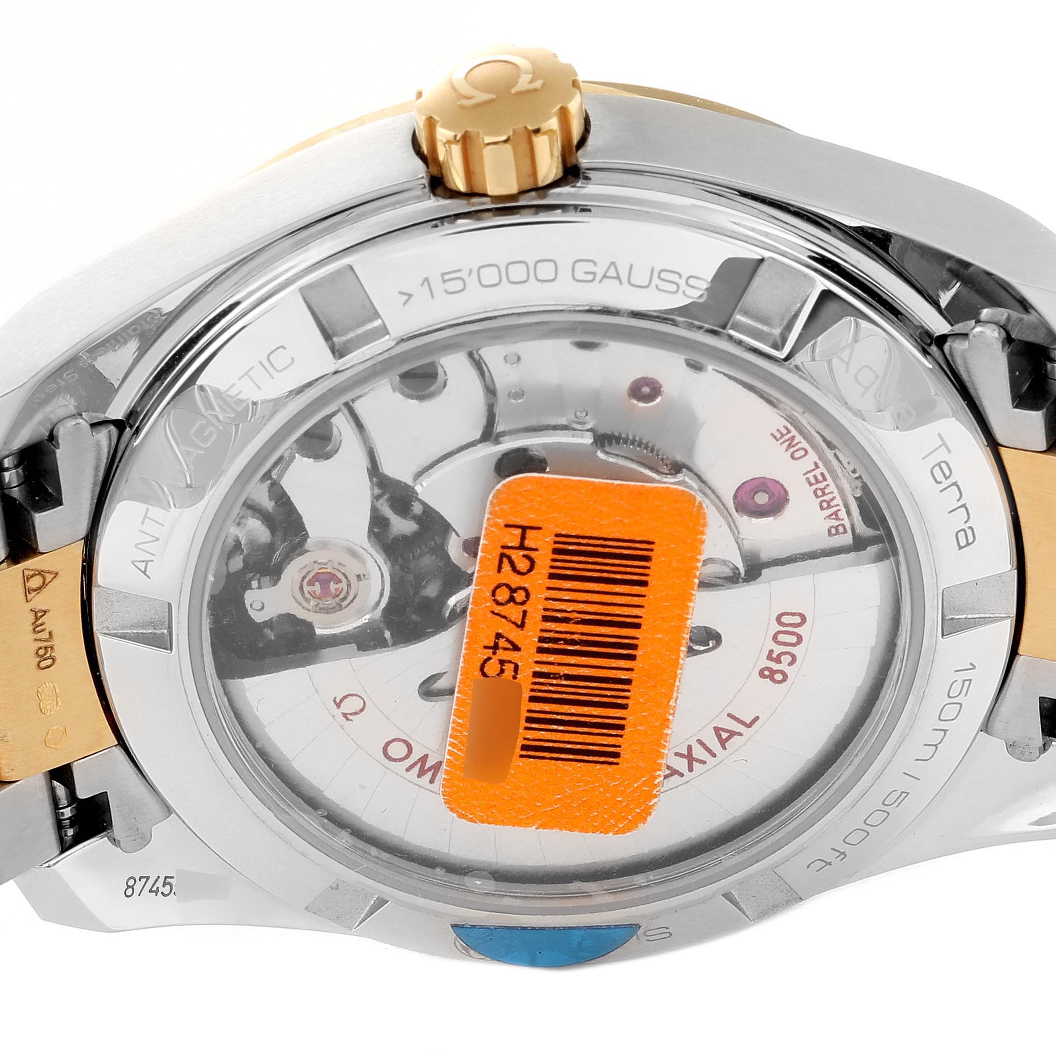 The image shows the back view of the Omega 231.25.39.21.55.002 Women's Stainless Steel Mother of Pearl Dial 231.25.39.21.55.002 Women's Stainless Steel Mother of Pearl Dial Aqua Terra Steel Yellow Gold Diamond Watch 231.25.39.21.55.002 showcasing its movement components.