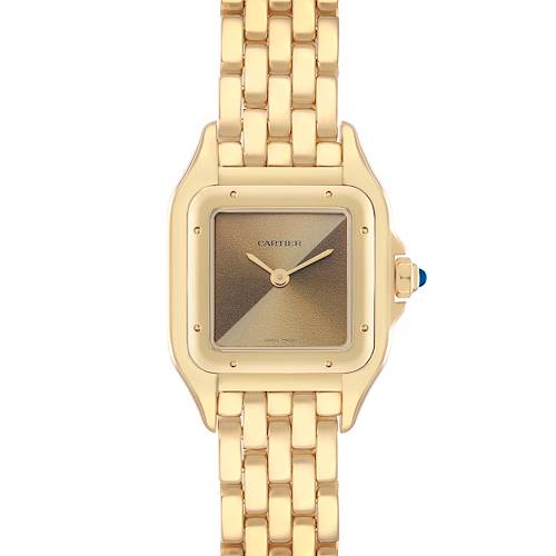 The Cartier Panthère watch is shown from a top-down angle, displaying its gold case, bracelet, and square dial with a blue cabochon crown.