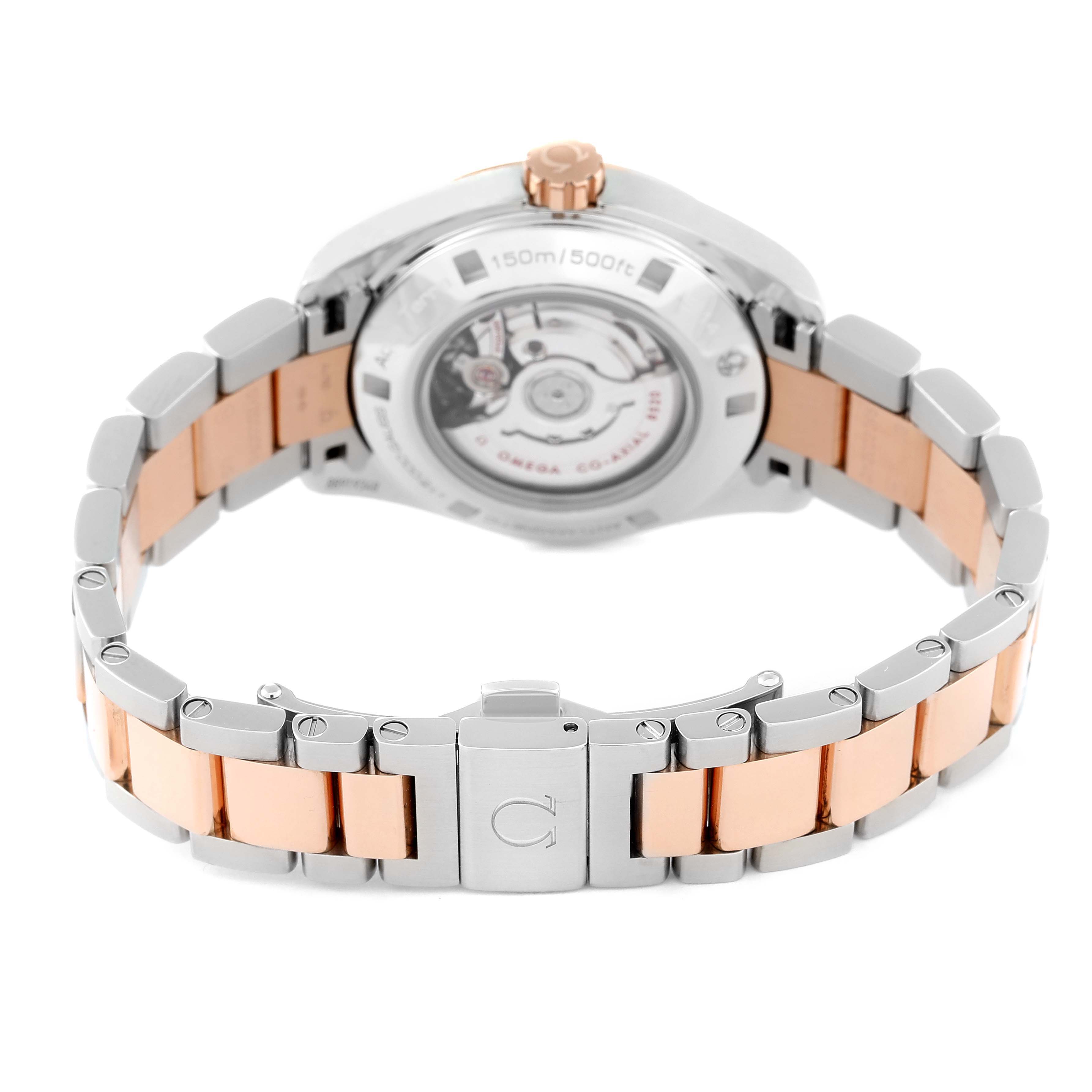 The image shows the back view of the Omega 231.20.34.20.55.001 Women's Steel and Gold (two tone) Mother of Pearl Dial 231.20.34.20.55.001 Women's Steel and Gold (two tone) Mother of Pearl Dial Aqua Terra Rose Gold MOP Diamond Ladies Watch 231.20.34.20.55.001, focusing on the clasp and bracelet.