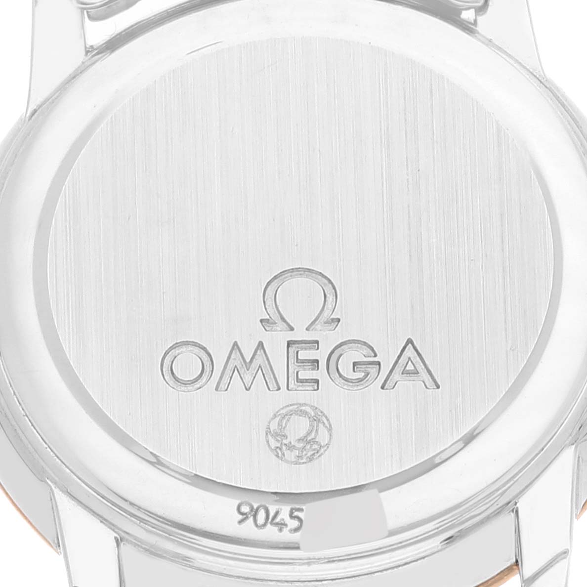 The image shows the case back of the Omega 4375.75.00 Women's Steel and Gold (two tone) Mother of Pearl Dial 4375.75.00 Women's Steel and Gold (two tone) Mother of Pearl Dial DeVille Mother Of Pearl Diamond Steel Yellow Gold Ladies Watch 4375.75.00.