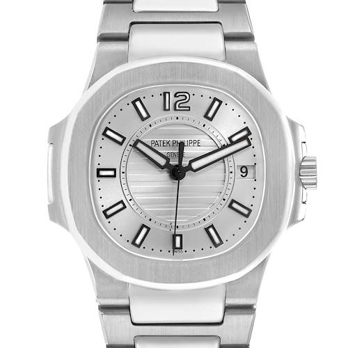 The Patek Philippe Nautilus 7011G Women's White Gold Silver Dial watch is shown from a top view, displaying the dial, hands, bezel, and part of the bracelet.