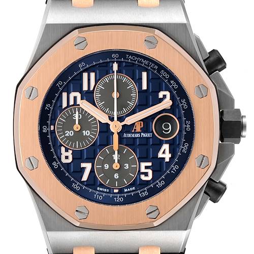 The image shows a front view of the Audemars Piguet Royal Oak Offshore 26471SR.OO.D101CR.01 Men's Steel and Gold (two tone) Blue Dial 26471SR.OO.D101CR.01 Men's Steel and Gold (two tone) Blue Dial watch, highlighting its blue dial, chronograph subdials, and tachymeter.