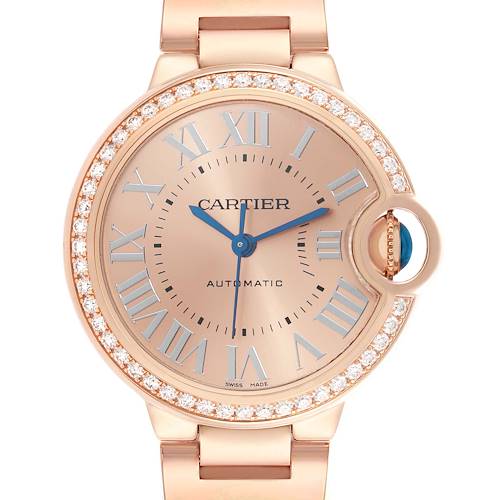 The Cartier Ballon Bleu WJBB0077 Women's Rose Gold Pink Dial watch is shown from the front, displaying the dial, Roman numerals, and diamond-encrusted bezel.