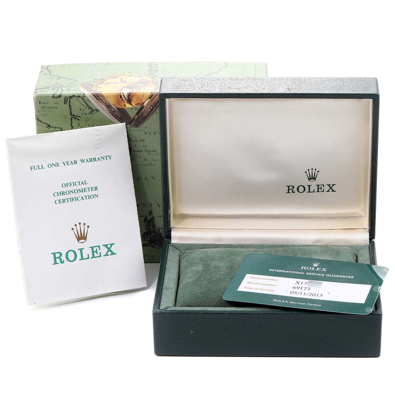 The image shows the open box, warranty card, and manuals for a Rolex Datejust 69173 Women's Steel and Gold (two tone) Black Dial 69173 Women's Steel and Gold (two tone) Black Dial watch, viewed from the front.