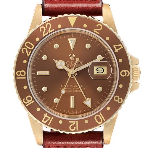The Rolex GMT-Master 1675 Men's Yellow Gold Brown Dial watch is shown from the front, highlighting its brown dial, 24-hour bezel, and date window.