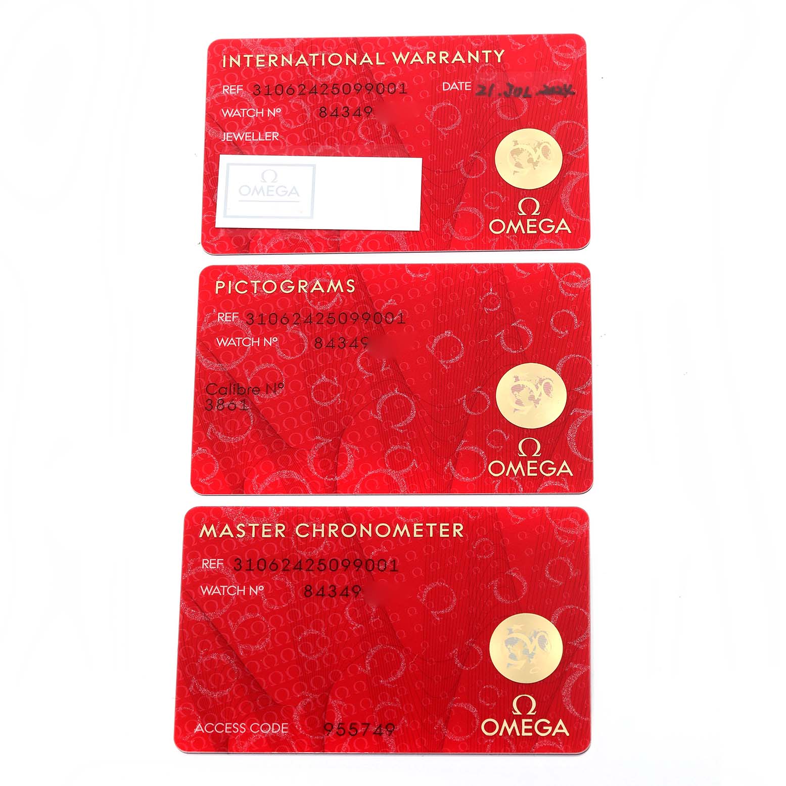 The image shows three red cards with information for an Omega Speedmaster 310.62.42.50.99.001 Men's Yellow Gold Champagne Dial 310.62.42.50.99.001 Men's Yellow Gold Champagne Dial, including warranty and certification details.