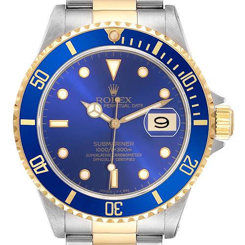 The Rolex Submariner 16613 Men's Steel and Gold (two tone) Blue Dial is shown from the front, highlighting the blue dial, gold accents, and the date window at 3 o'clock.