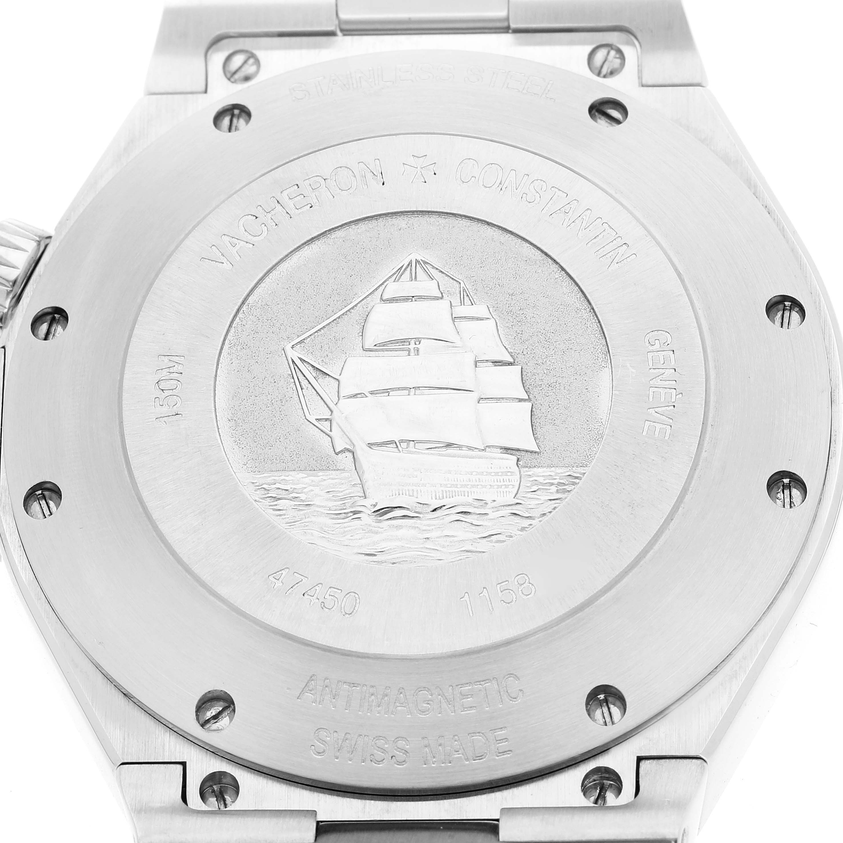 This image shows the caseback of a Vacheron Constantin Overseas 47450/B01A-9226 Men's Stainless Steel Silver Dial 47450/B01A-9226 Men's Stainless Steel Silver Dial watch, featuring an engraved ship and various inscriptions.