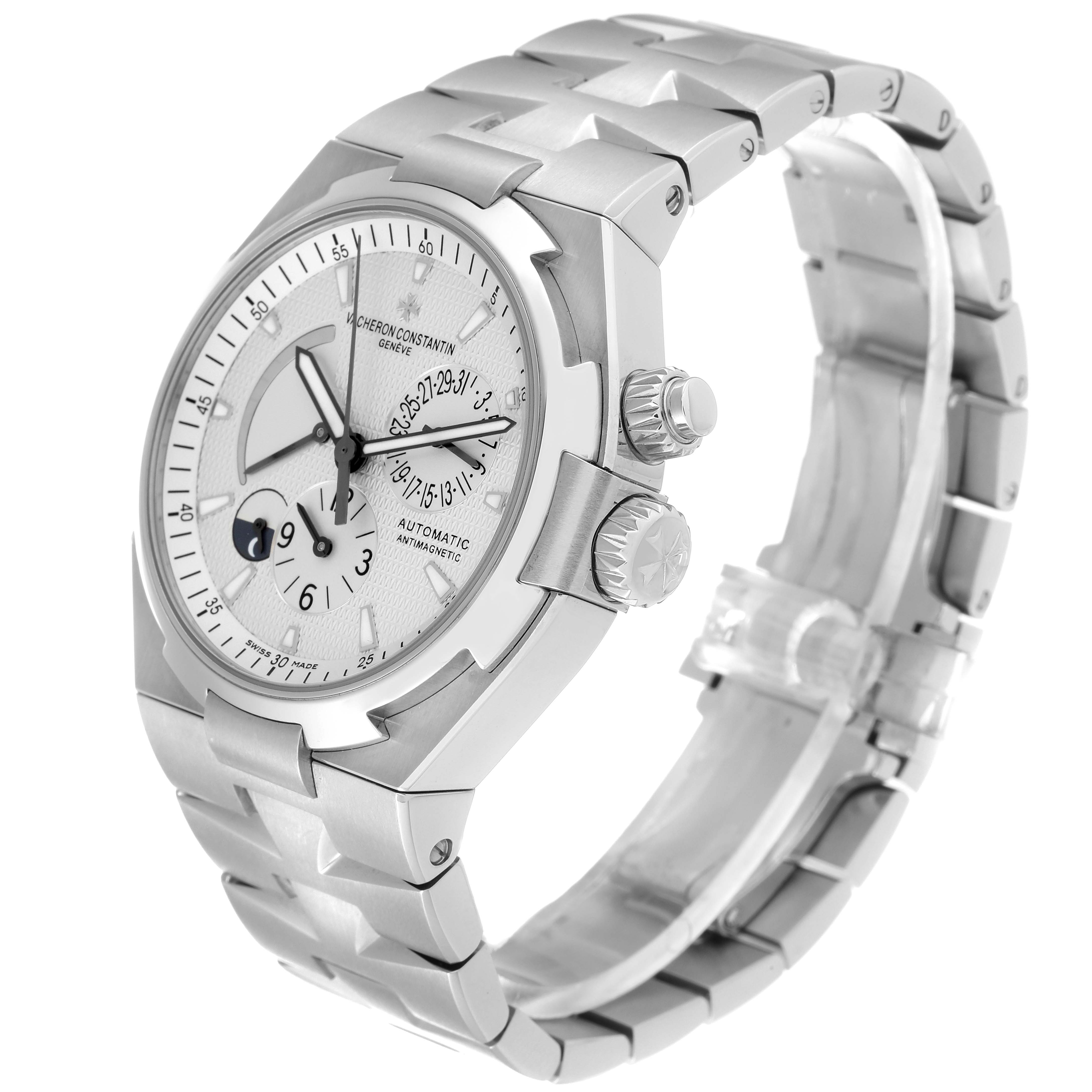 This image shows a Vacheron Constantin Overseas 47450/B01A-9226 Men's Stainless Steel Silver Dial 47450/B01A-9226 Men's Stainless Steel Silver Dial model watch angled to display its silver dial, case, and bracelet.