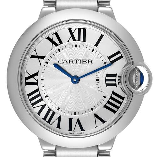 The image shows the face of a Cartier Ballon Bleu W69011Z4 Men's Stainless Steel Silver Dial W69011Z4 Men's Stainless Steel Silver Dial watch with Roman numerals and a blue steel sword-shaped hand.
