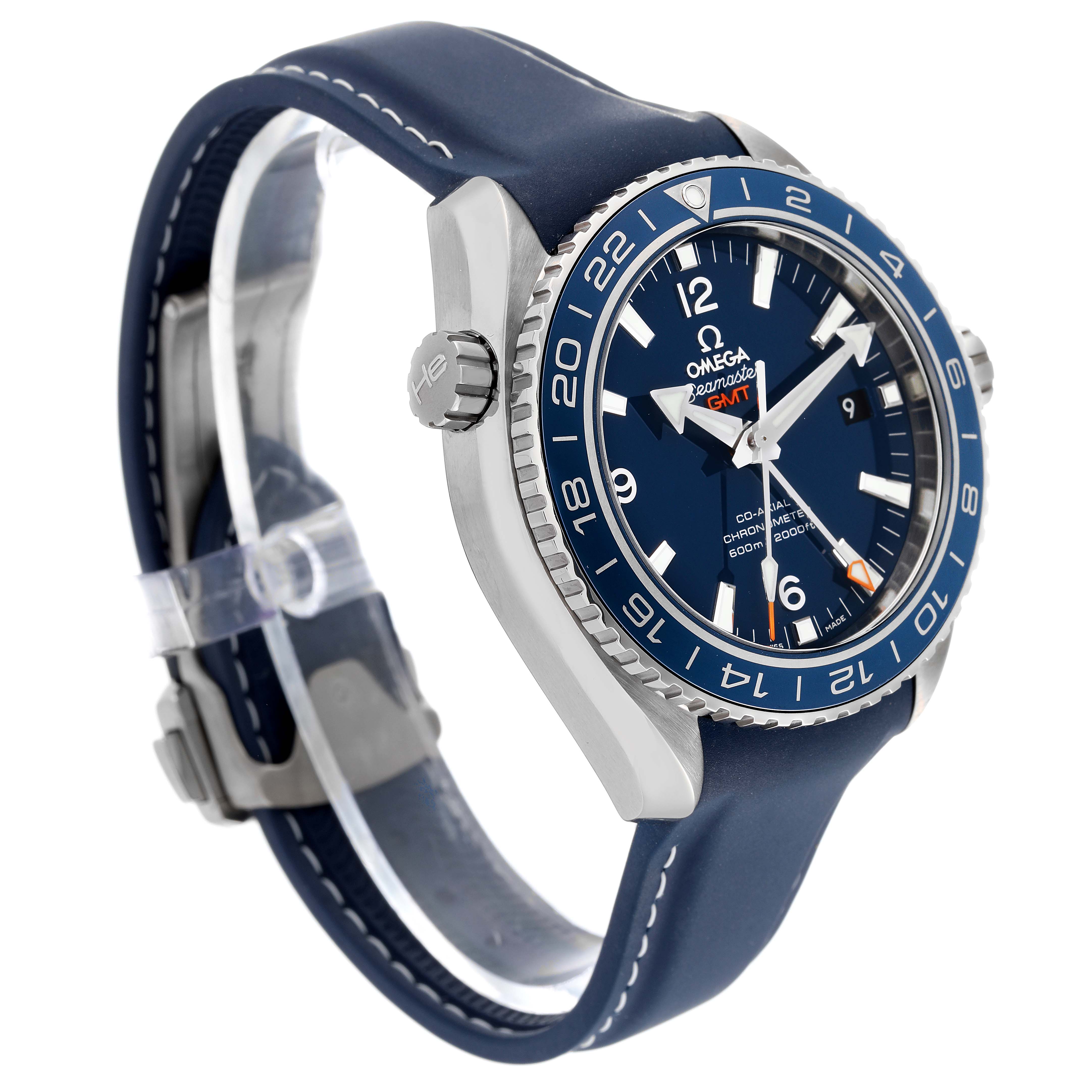 The image shows an angled view of an Omega Planet Ocean 232.92.44.22.03.001 Men's Titanium Blue Dial 232.92.44.22.03.001 Men's Titanium Blue Dial watch, highlighting the blue dial, bezel, and strap with white stitching.