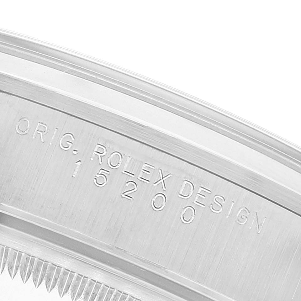 Close-up of the side casing of a Rolex Date 15200 Men's Stainless Steel Black Dial 15200 Men's Stainless Steel Black Dial model, showing the "ORIG. ROLEX DESIGN" engraving and model number 15200.