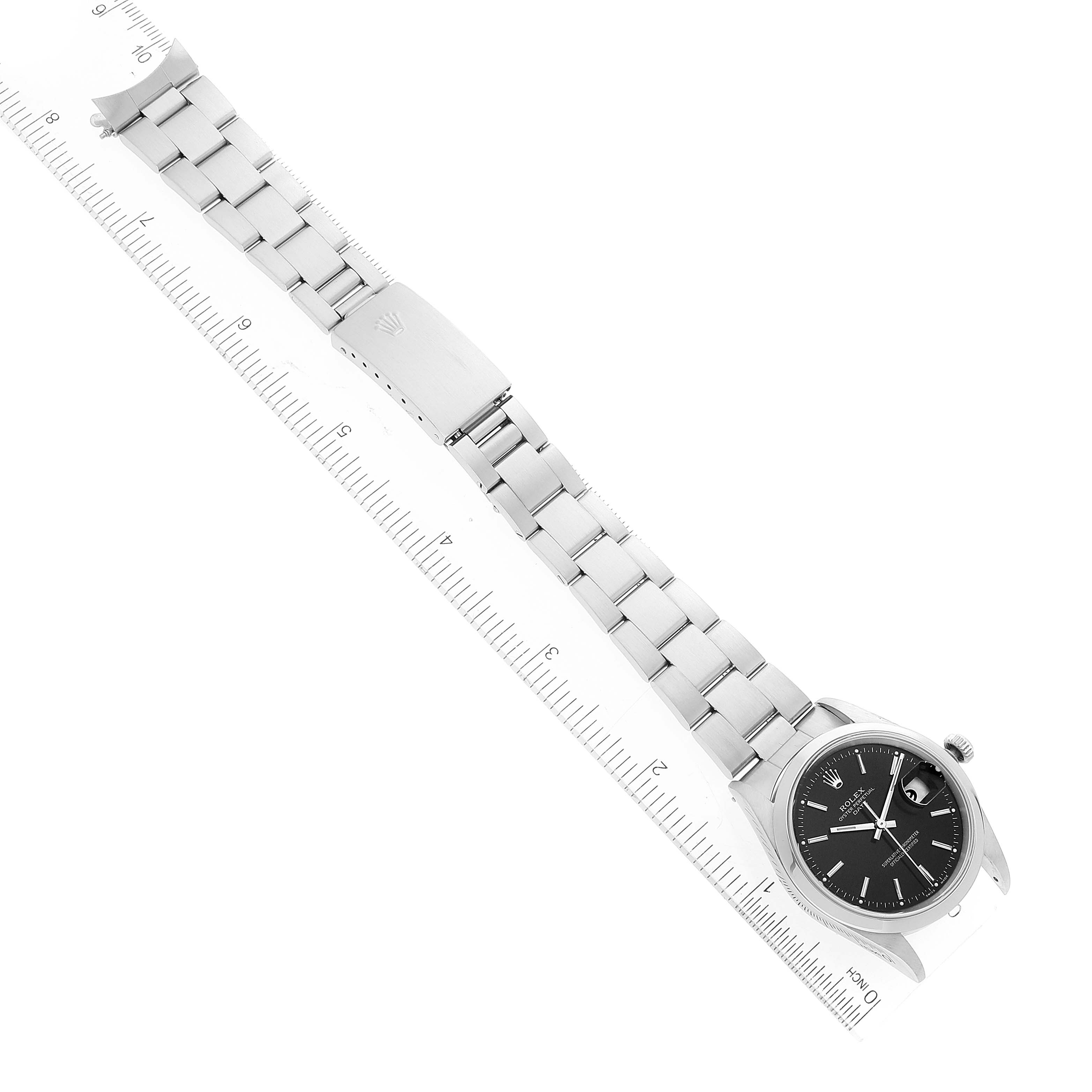 This image shows a top-down view of a Rolex Date 15200 Men's Stainless Steel Black Dial 15200 Men's Stainless Steel Black Dial model watch with the face, bracelet, and clasp visible along a ruler.