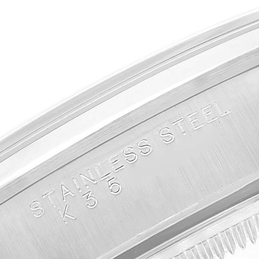 The image shows a close-up of the side engraving on a stainless steel Rolex Date 15200 Men's Stainless Steel Black Dial 15200 Men's Stainless Steel Black Dial model watch.