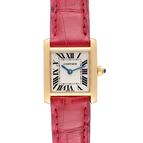 The image shows a front view of a Cartier Tank Francaise W5000256 Women's Yellow Gold Silver Dial W5000256 Women's Yellow Gold Silver Dial watch with a pink leather strap and a rectangular gold case.