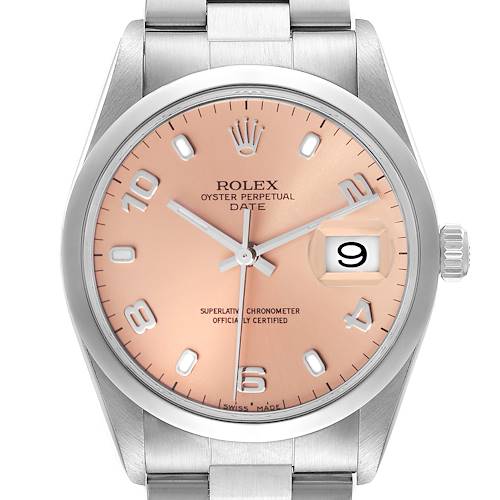 The image shows a Rolex Oyster Perpetual Date watch, displaying its salmon dial, hour markers, hands, date window, and part of the bracelet.