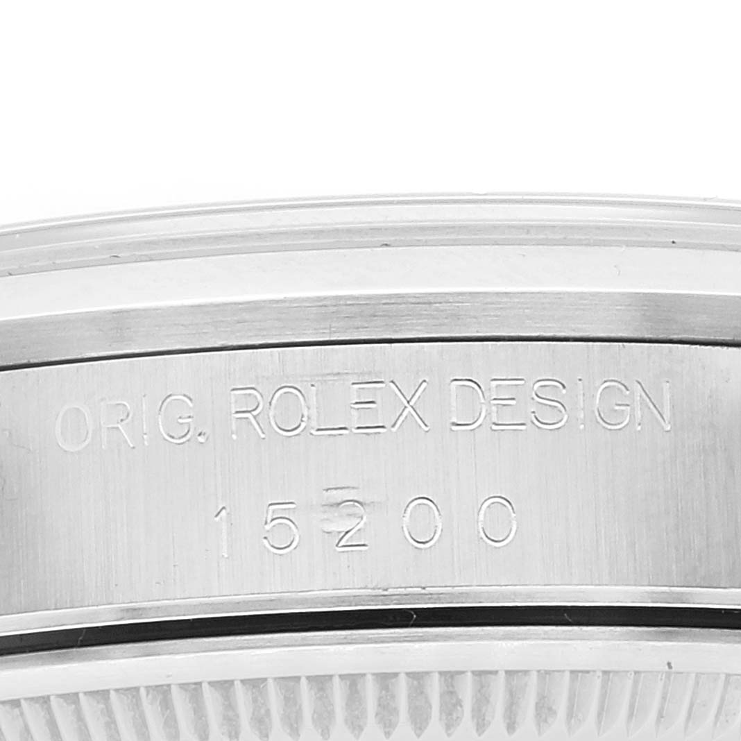 This close-up image shows the side engraving on the case of a Rolex Date 15200 Men's Stainless Steel Pink Dial 15200 Men's Stainless Steel Pink Dial model watch, 15200.