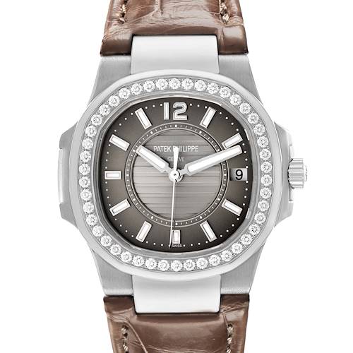 The Patek Philippe Nautilus 7010G-010 Women's White Gold Silver Dial watch is shown from the front, displaying the face, bezel, and part of the brown strap.