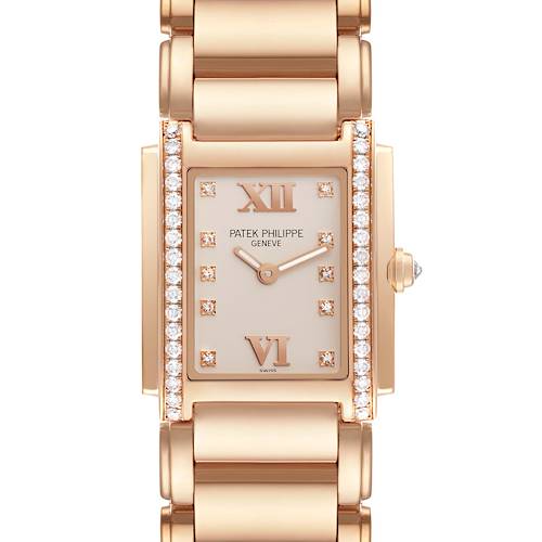 The image shows a front view of the Patek Philippe Twenty-4 4910/11R-011 Women's Rose Gold Silver Dial 4910/11R-011 Women's Rose Gold Silver Dial watch, highlighting the face, dial, case, and part of the bracelet.