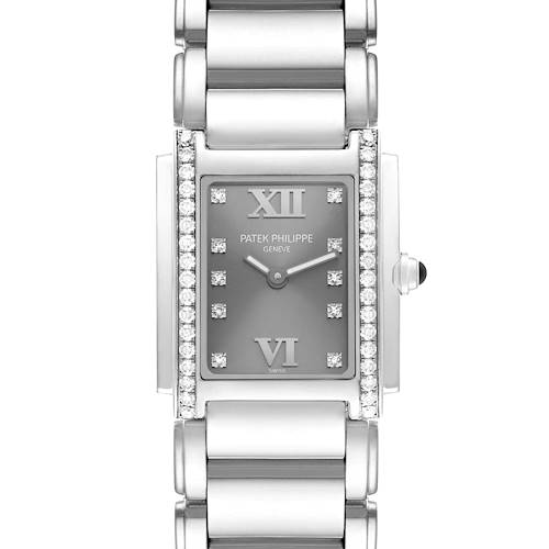 The Patek Philippe Twenty-4 4910/10A-010 Women's Stainless Steel Silver Dial watch is shown from the front, highlighting the rectangular dial and diamond accents on the bezel.